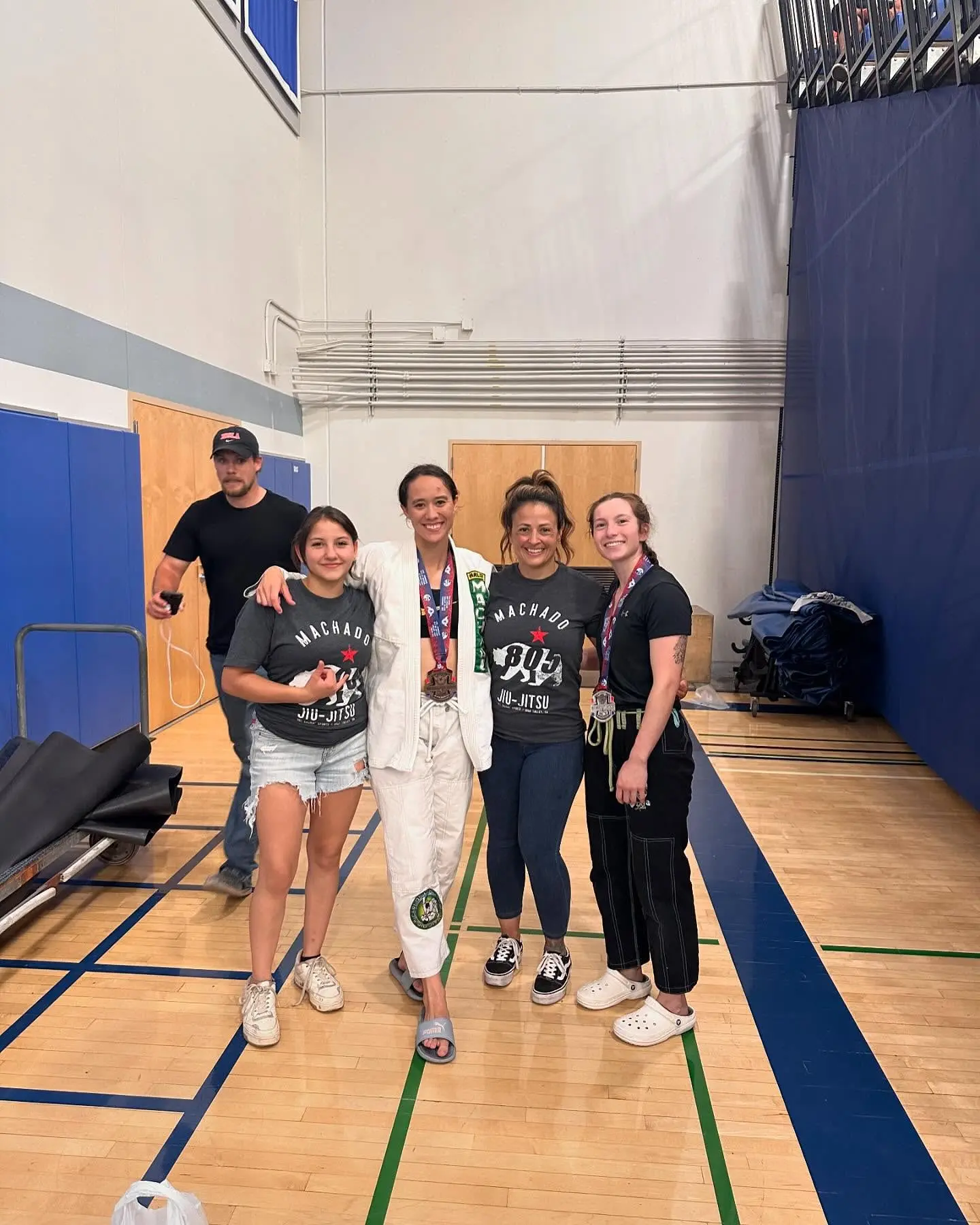 Women from 805 Combat Sports with their medals after a Brazilian Jiu-Jitsu competition