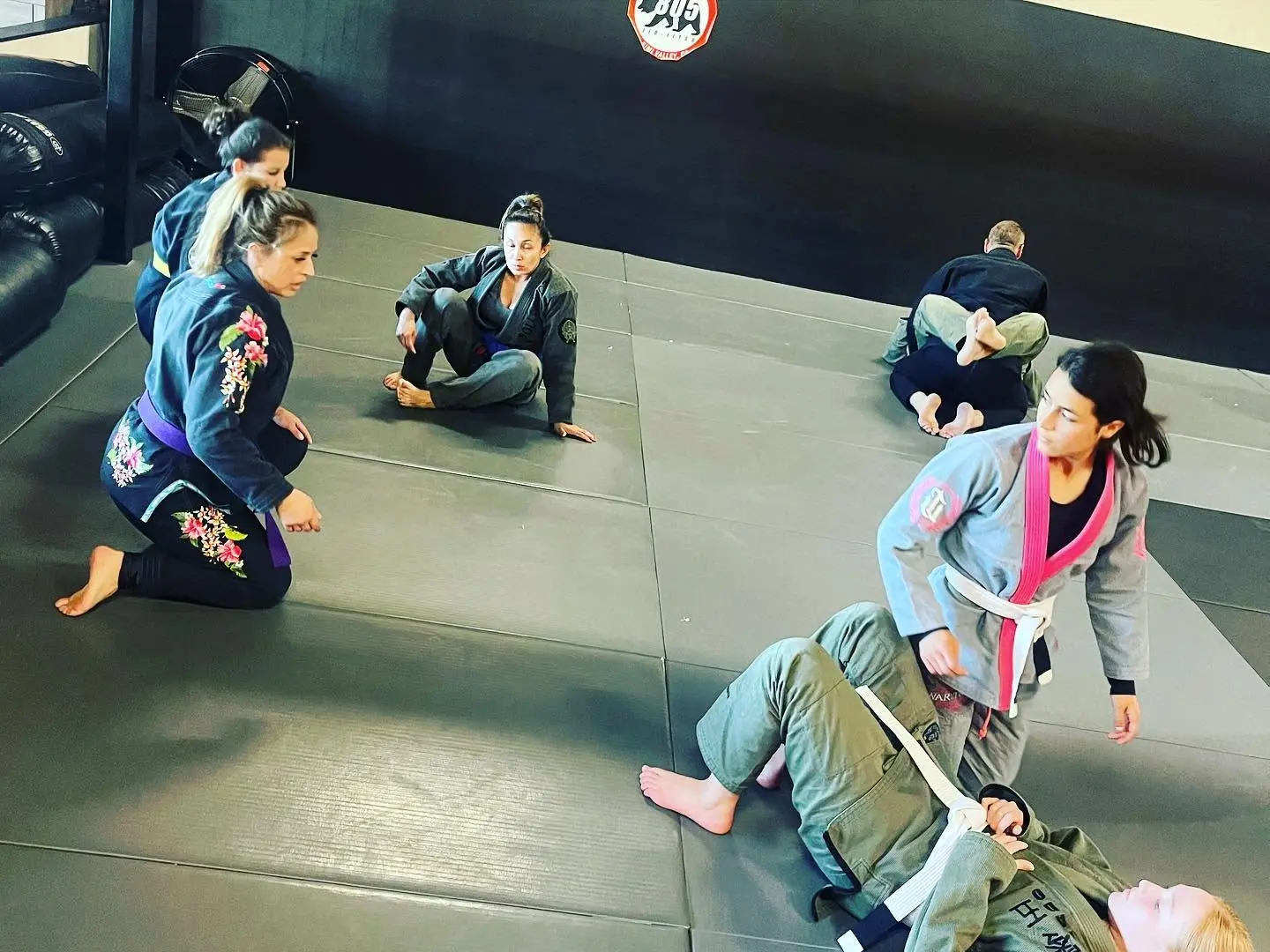 Women drilling a self-defense technique together at 805 Combat Sports in Simi Valley