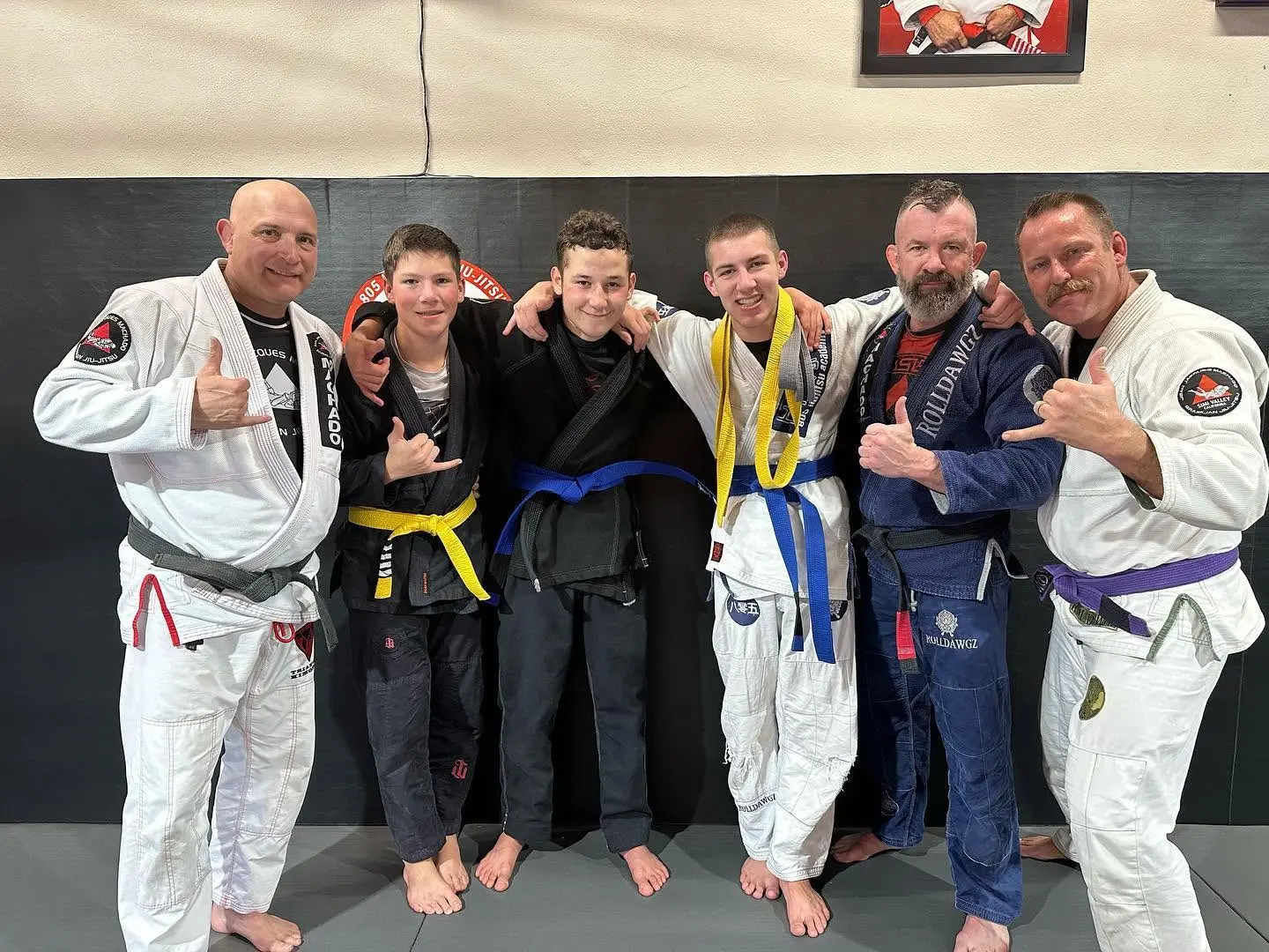 A young student earning a belt promotion at 805 Combat Sports in Simi Valley